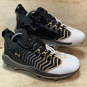 Under Armour Black and White Athletic Shoes with Gold Accents